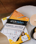 Draw Circuits With Conductive Ink Pen Kit, 11 Electronic Sticker Modules, And A 27 Lesson Workbook for STEM fun, ages 8+ on table