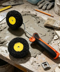 Drywall Corner Compound Roller Kit With Pumpkin Shaped Joint Head For Inside And Outside Corners Durable Nylon Bristle Pro Edger Tool on workspace with gray compound.