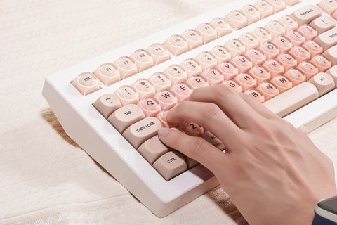 Clean 80 Percent Wireless Mechanical Keyboard In Soft Pink Creamy Build featuring Jelly Moa Profile Transparent Keycaps and Smooth Linear Switches.