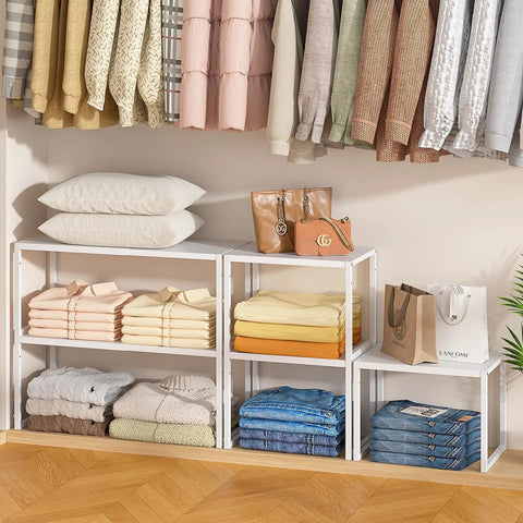 3 Pack Expandable Metal Closet Organizer Shelves with folded clothes, pillows, and handbags for neat home storage.
