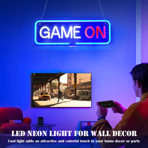 Lit Gaming Neon Sign Light For Bedroom Decor LED neon art in blue and red GAME ON text glowing above a gamer holding a controller