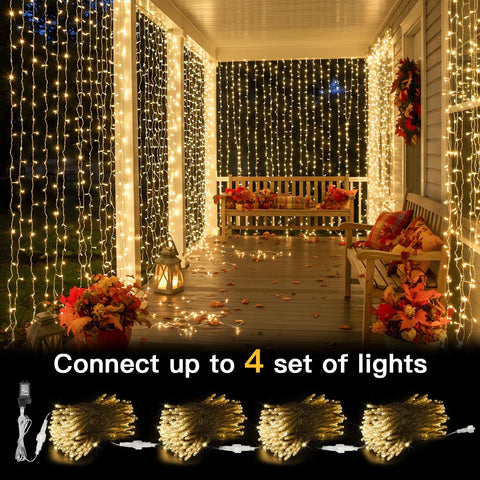 Warm White Curtain String Lights 300 LEDs 9.8x9.8 Ft Plug In Backdrop illuminating porch with autumn decor