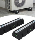 Rock Solid Rubber Mini Split Base Pad Set Of 2 For AC Condenser Leveling Feet shown under an AC unit, showcasing vibration dampening features.