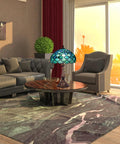Sea Blue Pear Stained Glass Shade Tiffany Style Table Lamp With 12 Inch Wide 19 Inch Tall Antique Bronze Base in cozy living room.