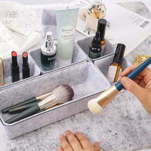 Customizable 8 Pack Felt Drawer Organizer Trays Set For Desk Drawers Shallow Modular Storage Bins For Office Supplies Makeup And Jewelry In Light Gray Mix And Match To Fit Any Drawer Like A Pro holding makeup items.