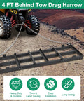 Beefy Heavy Duty 4 Ft Driveway Grader Power Rake With 4 Ft Chain attached to ATV, leveling gravel on rugged terrain