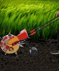 Person using Hand Push Garden Seeder With 7 Nozzles Adjustable Depth 1.38 To 3.07 Inches 9.06 Inch Row Spacing Precise Seed Planter