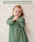 Child wearing Cozy Sleeved Baby Sleep Sack For 0 To 6 Months Lightweight 0.5 Tog Wearable Blanket Made From 100 Percent Cotton