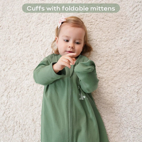 Child wearing Cozy Sleeved Baby Sleep Sack For 0 To 6 Months Lightweight 0.5 Tog Wearable Blanket Made From 100 Percent Cotton