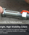 Top Notch Hot Pink Tamper Seal Inspection Paint For Bolts Fasteners With Instant Crack Detection Quick Drying Formula No Sweat Setup For Cars And Daily Driver Gearhead Hangouts One Point Five Ounces applied on a bolt for visibility.