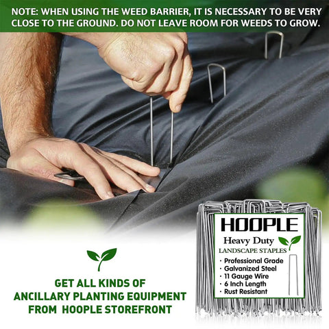 Person installing Tough As Nails Weed Barrier Landscape Fabric 3ft By 30ft with steel staples, commercial-grade ground cover.