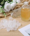 60 Pcs Salt And Pepper Stoppers Plugs Set In Six Sizes 10mm 13mm 15mm 18mm 20mm 23mm Plastic Reusable Round End Caps next to bottle