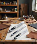 Three-Piece Grommet Hole Punch Set for Leatherworking with steel hollow punches on workshop table