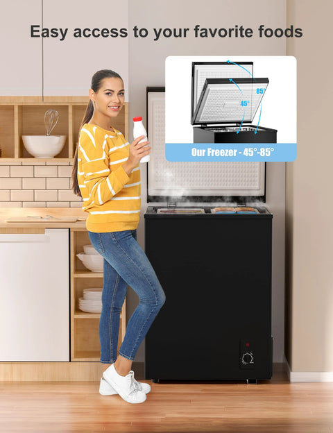 Woman using Ultra Quiet 5.0 Cu Ft Deep Freezer With Compact Design For Home And Small Shops in kitchen setting.