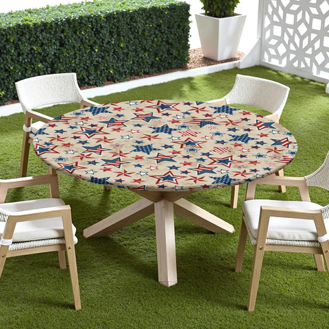 Patriotic round tablecloth with elastic edge on 40-44 inch table, red white blue stars, outdoor patio setup