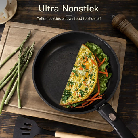 21 Piece Nonstick Ceramic Pots And Pans Set With Detachable Handles, skillet with omelet on wooden board