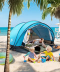 Pop Up Beach Tent For 2 To 4 People Large Sun Shade Shelter With Instant Setup on sunny beach with family relaxing and playing