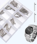 Stainless Steel Watch Band Pins Replacement Kit With Quick Release Spring Bars visible with box and watch, 14mm to 24mm fit, 62 piece set