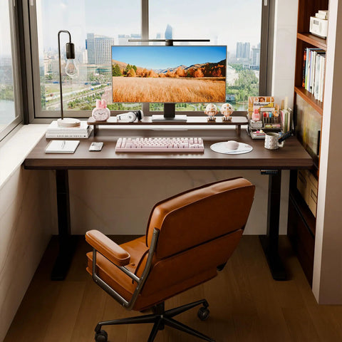 Rock Solid Electric Standing Desk Crafted From Genuine Solid Rubberwood Desktop With Quick Motorized Height Adjustment For Comfortable Home Office Computer Workstation with brown chair and monitor in home office.