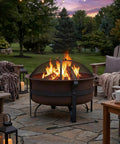 Cauldron Wood Burning Outdoor Fire Pit For Patio And Backyard Hangouts Round Steel Fire Bowl With dark bronze finish on patio