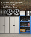 Garage with tires on cabinets, blue shelf, highlighting brushed nickel appliances and modern curve details.