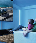 TV Cord Hider 42 Inch Cord Cover For Large Cable Management, installed behind wall-mounted TV in modern living room