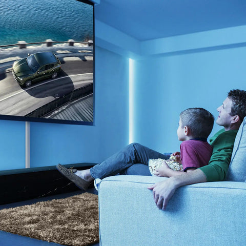 TV Cord Hider 42 Inch Cord Cover For Large Cable Management, installed behind wall-mounted TV in modern living room