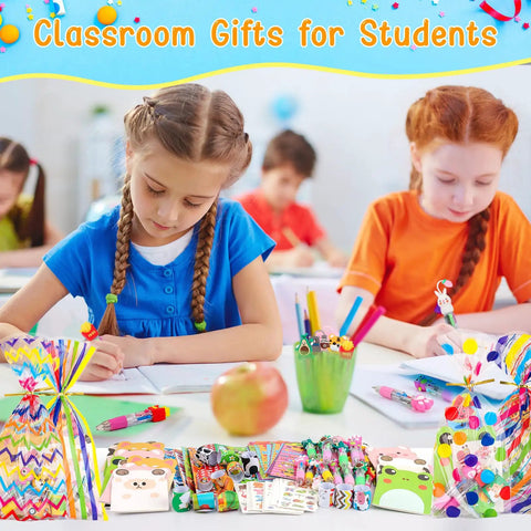 Children using All In One Stationery Party Pack For Kids With 24 Goodie Bags Mini Notebooks Multicolor Pens Slap Bracelets
