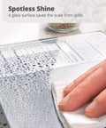 Nutrition Food Scale For Meal Planning And Portion Control With Food Code Booklet And App Non Connected And Non Backlit Model being wiped clean with a cloth