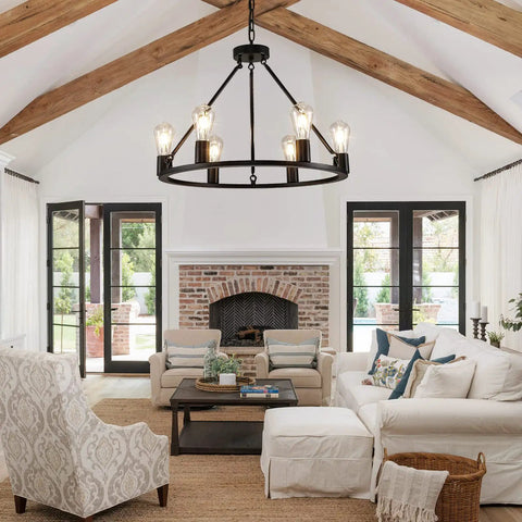 Industrial Black Wagon Wheel Chandelier With Six Candle Style Lights Dope Farmhouse Vibe Ceiling Fixture in modern living room