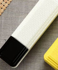 Rugged Solderless 18650 Battery Box With Usb Quick Charge Input Portable Power Supply Enclosure on textured fabric background.