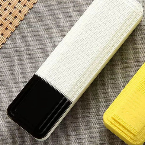 Rugged Solderless 18650 Battery Box With Usb Quick Charge Input Portable Power Supply Enclosure on textured fabric background.