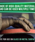 Hand using Reusable Medium Grade Nano Clay Pad For Auto Detailing 6 Inch Orbital Synthetic Clay Bar Pad on glass surface