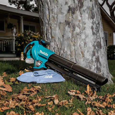 3-In-1 Cordless Leaf Blower Vacuum Mulcher, 18V LXT Brushless Tool Only, on lawn with fallen leaves near tree