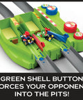 Hot Wheels Mario Kart Circuit Track Set With 2 Die Cast Vehicles shown in green pit lane feature with Mario and Yoshi karts