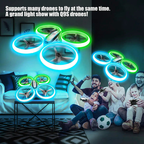 Family enjoying Kids Drone With Altitude Hold And Headless Mode Quad Copter With Neon Blue And Green Lights in living room