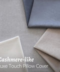 Various shades of cashmere-like luxe touch pillow covers folded, showcasing texture and softness.