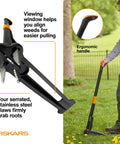 Stand-Up Weed Puller Tool With 4 Serrated Claws, Reinforced Foot Platform, 39 Inch Reach in use on grass