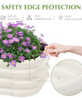 Close-up of Two Pack 2 By 1 Foot Galvanized Raised Garden Bed Kit with purple flowers, showing safety edge and durable metal planter box.