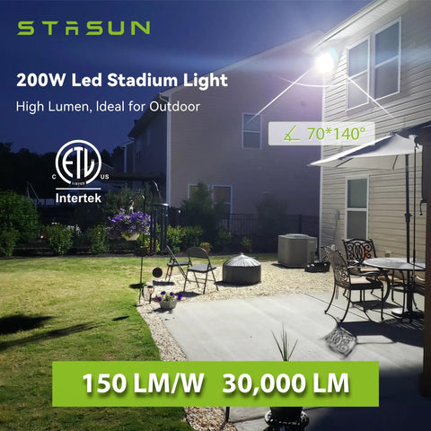 Residential yard illuminated by 200W LED stadium light mounted on house, showcasing outdoor lighting coverage.