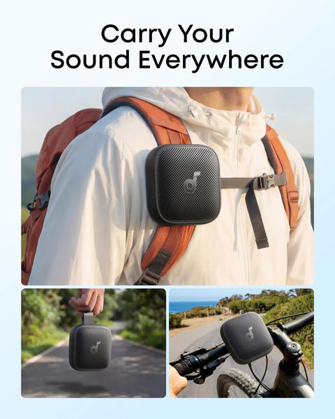 Boom Go 3i Palm Sized Portable Bluetooth Speaker attached to a backpack, ideal for hiking and camping, black.