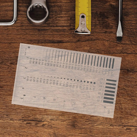 High Precision Measuring Ruler for Crack Width and Diameter Defect Detection in Work Sites on wooden table with tools