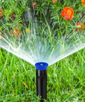 Variable Arc Sprinkler Nozzles 10 Pack Pop Up Head Replacements For Killing It On The Lawn Fully Adjustable 360 Degree Spray Pattern in grass.