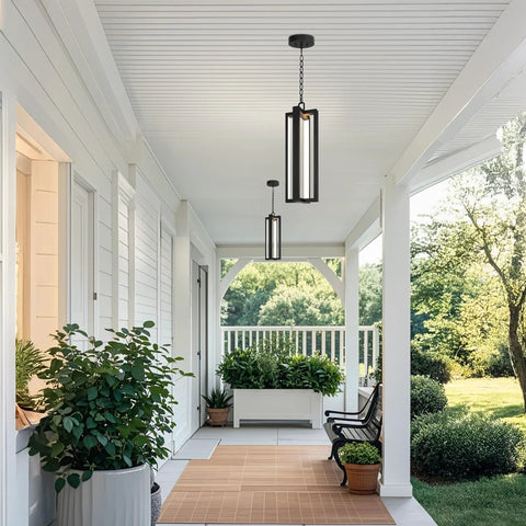 Heavy Duty Black Aluminum Led Outdoor Pendant Light 20 Inch Linear Chandelier illuminating a porch with greenery and seating.