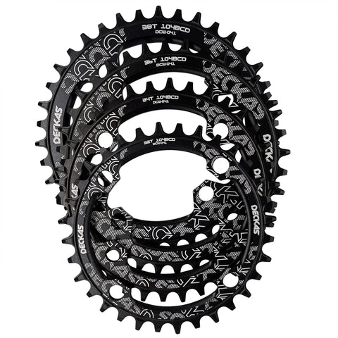 Round Oval 104BCD Chainring 32T 34T 36T 38T Narrow Wide Beefy Teeth Design For 6 7 8 9 10 11 12 Speed Chains Fits Most Shimano And Sram Cranksets Black 38T Durable Aluminum, showing multiple chainrings stacked.