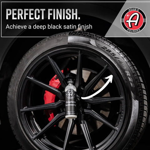 Graphene Tire Dressing for Deep Black Satin Finish bottle on a wheel showcasing non-greasy car detailing solution, black satin finish.