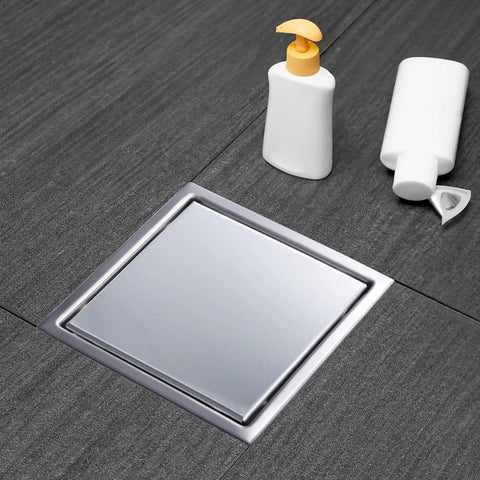 6 Inch Square Shower Drain Featuring Killer Flow Performance On Heavy Duty Stainless Steel with tile insert cover in bathroom setting.