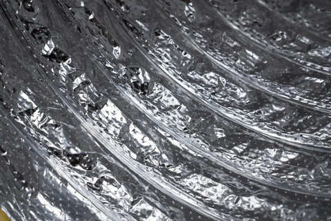 Close-up of Five Inch Aluminum Flexible Insulated HVAC Duct Pipe With R4.2 Insulation, air tight core visible
