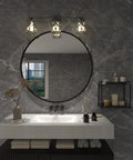 Matte Black 3 Light Vanity Fixture With Crystal Shades For Bathroom And Bedroom above round mirror, elegant glam vibe