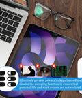 50 Pack Ultra Slim Webcam Covers Universal Laptop Phone Tablet Camera Slider Blocker on a desk with glasses and mouse.